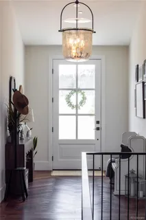 a spacious bedroom with a bed and a couch