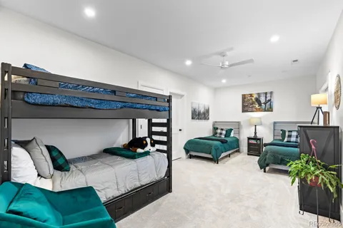 a bedroom with furniture and a window