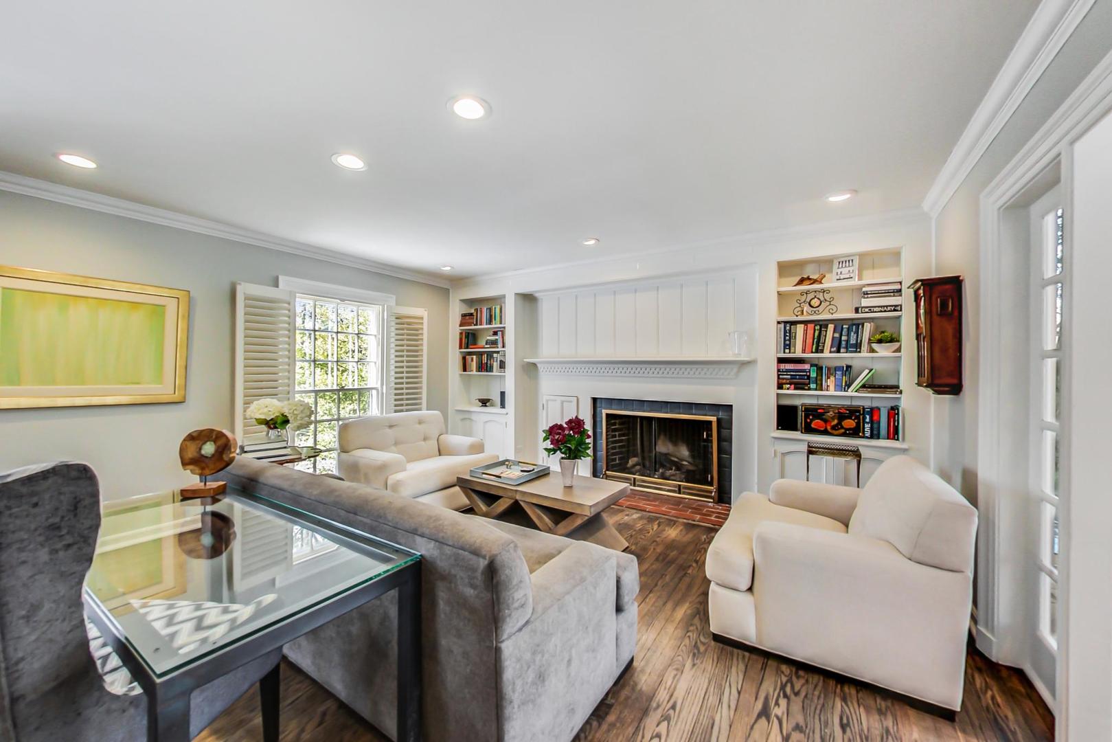 875 Fairview Road Highland Park, IL 60035 - Photo 4 of 32 a living room with furniture fireplace and window