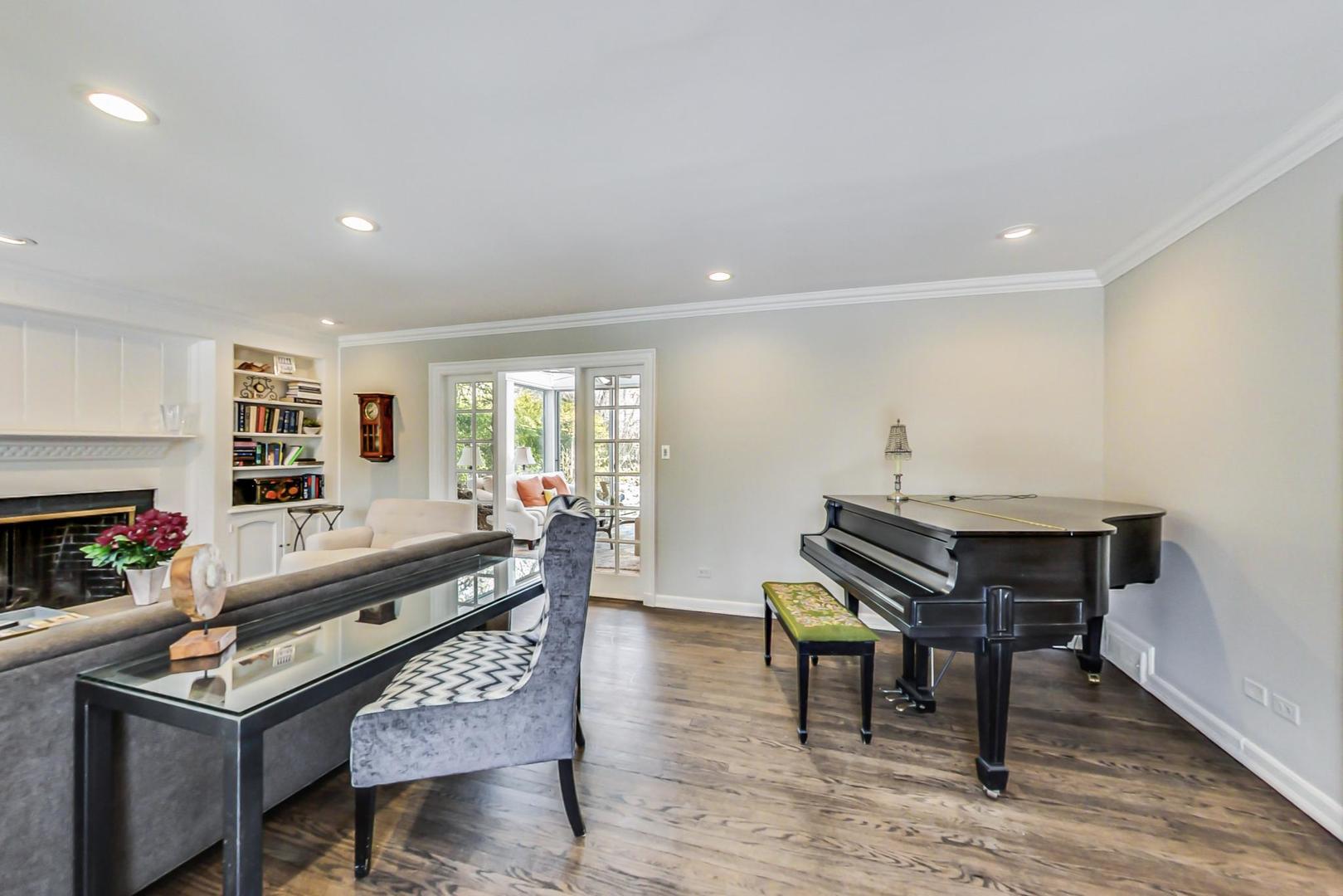 875 Fairview Road Highland Park, IL 60035 - Photo 5 of 32 a living room with furniture and a wooden floor