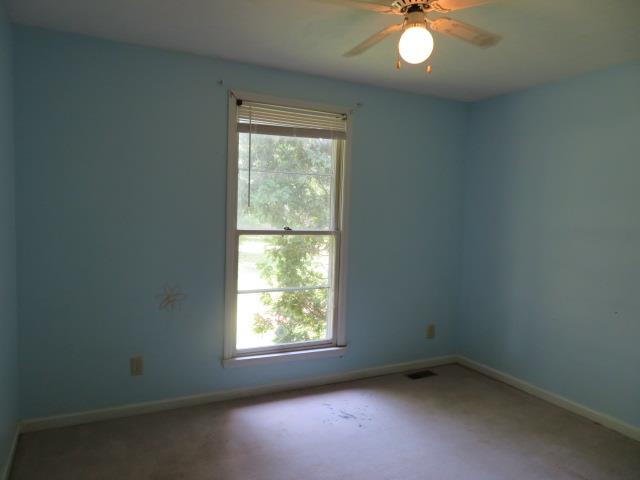 823 Hadley Road Clarksville, TN 37042 - Photo 12 of 14 an empty room with a window