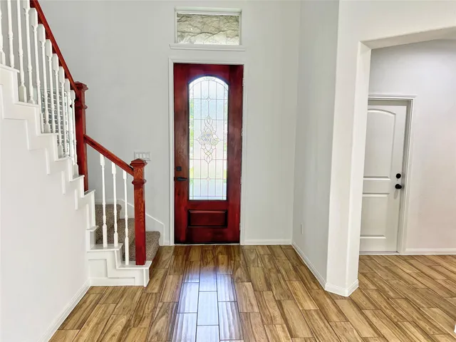 a view of front door with hallway