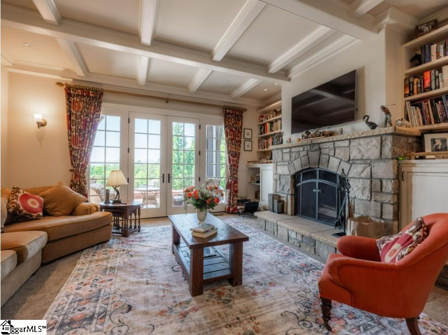 2921 North Pacolet Road Landrum, SC 29356 - Photo 18 of 50 Flows from the Kitchen to a covered outdoor patio deck with hot tub overlooking pastures and barn