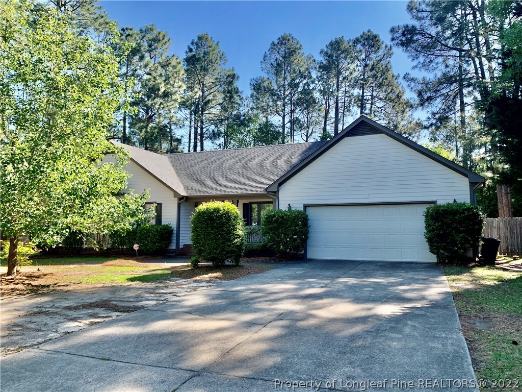 7800 Trappers Road Fayetteville, NC 28311 - Photo 1 of 20 a view of a house with backyard and garden