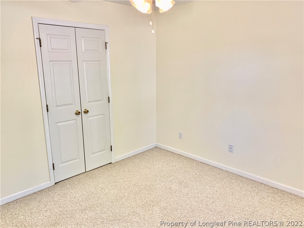 7800 Trappers Road Fayetteville, NC 28311 - Photo 15 of 20 an empty room with closet area