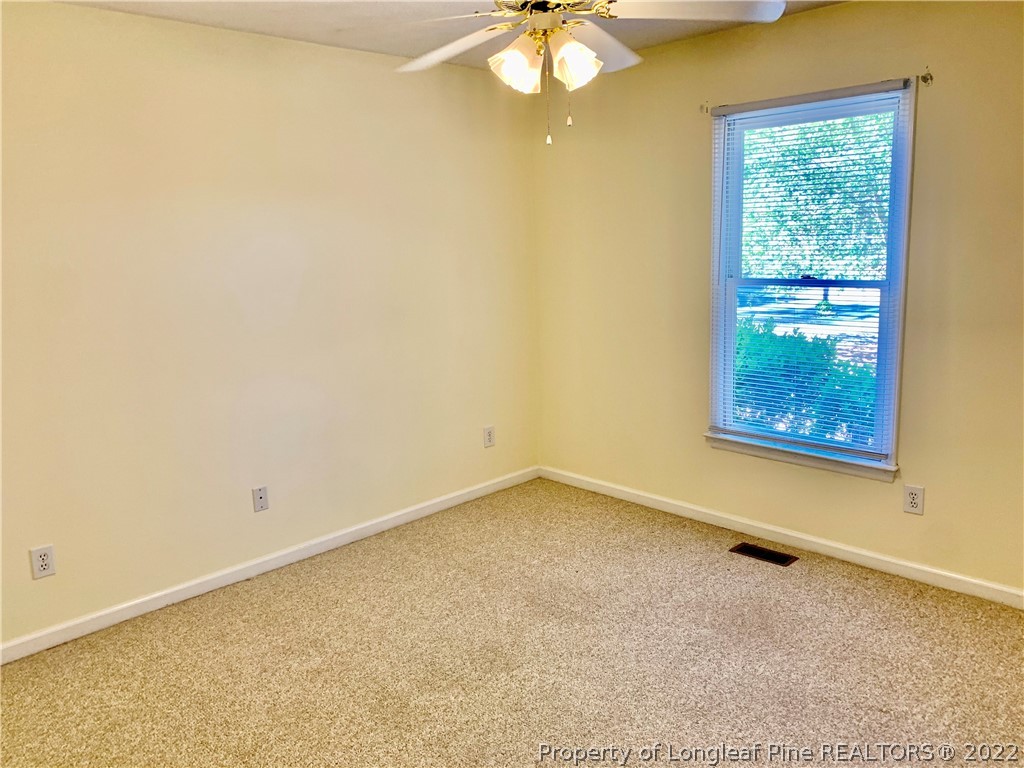7800 Trappers Road Fayetteville, NC 28311 - Photo 16 of 20 an empty room with a window