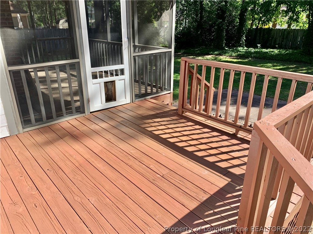7800 Trappers Road Fayetteville, NC 28311 - Photo 17 of 20 a view of balcony with wooden floor