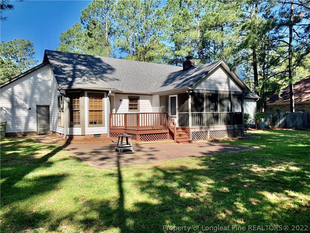 7800 Trappers Road Fayetteville, NC 28311 - Photo 18 of 20 a front view of a house with a yard
