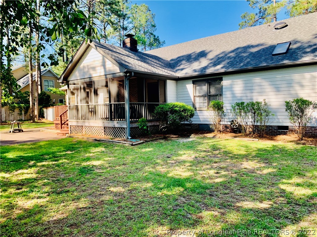 7800 Trappers Road Fayetteville, NC 28311 - Photo 20 of 20 a view of a house with backyard and sitting area