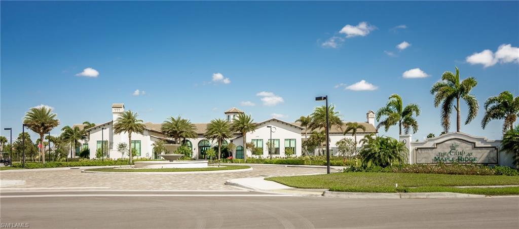 5542 Useppa Drive Ave Maria, FL 34142 - Photo 11 of 15 a view of a fountain in front of a house