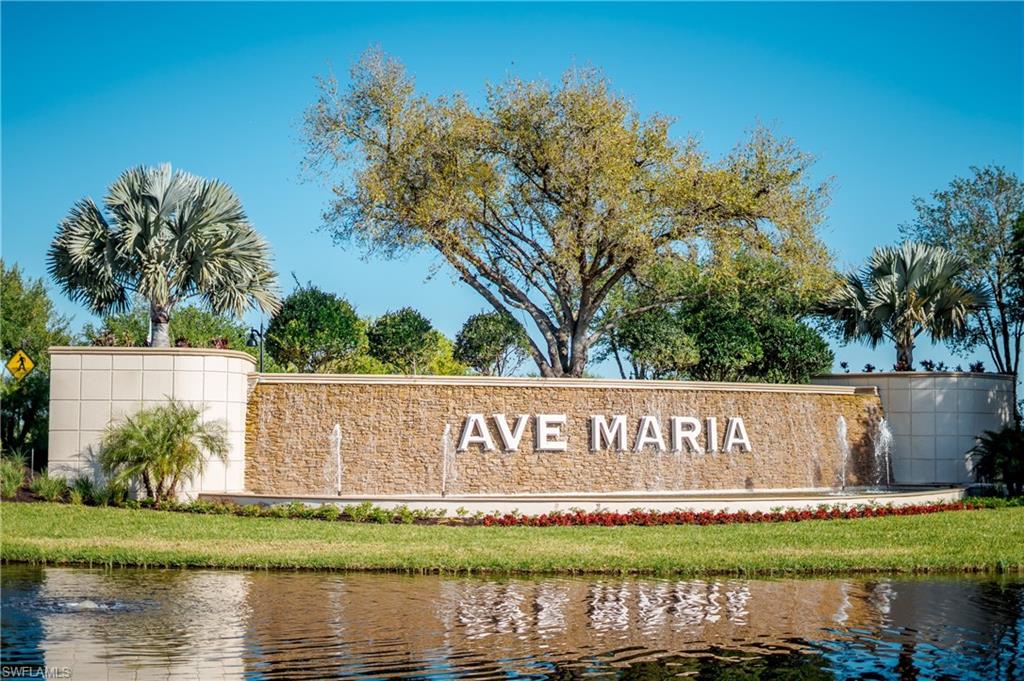 5542 Useppa Drive Ave Maria, FL 34142 - Photo 9 of 15 a view of swimming pool with garden