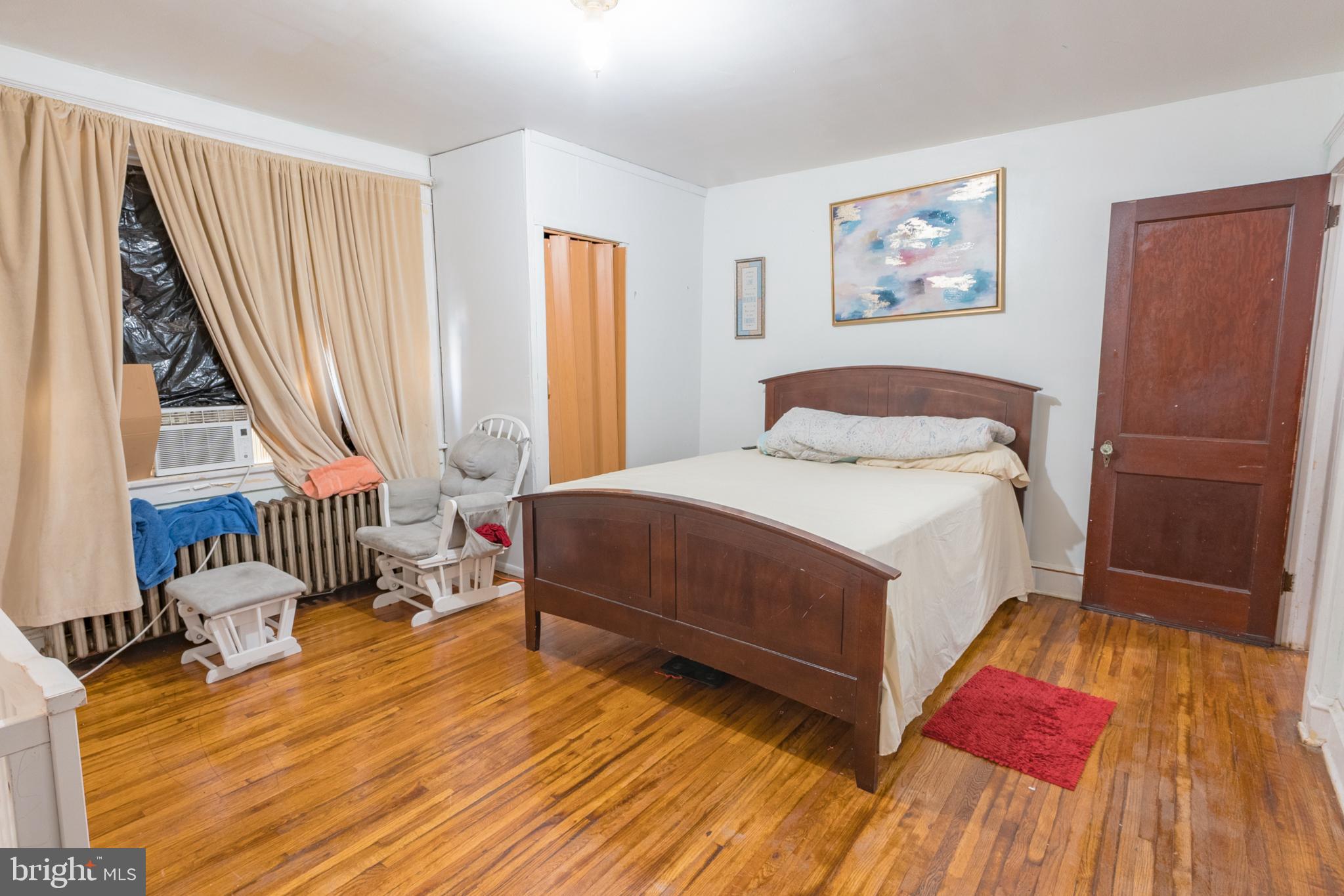 1020 Meade Street Reading, PA 19611 - Photo 14 of 28 a bedroom with a bed and a window