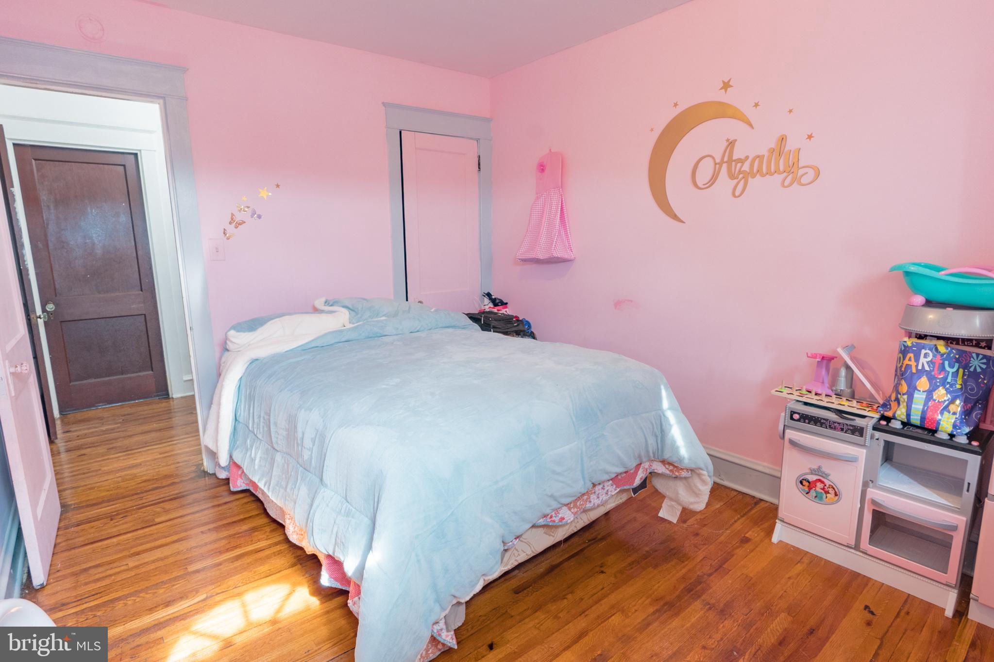 1020 Meade Street Reading, PA 19611 - Photo 21 of 28 a bedroom with a bed and a flat screen tv