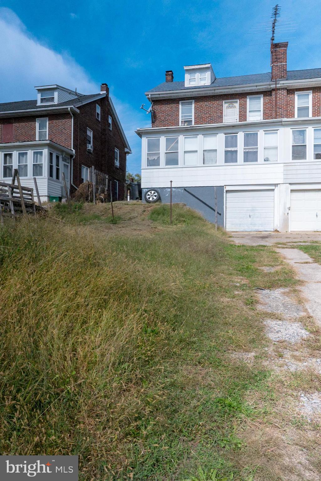 1020 Meade Street Reading, PA 19611 - Photo 26 of 28 a front view of a house with a yard