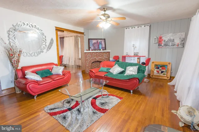 a theatre with furniture and wooden floor