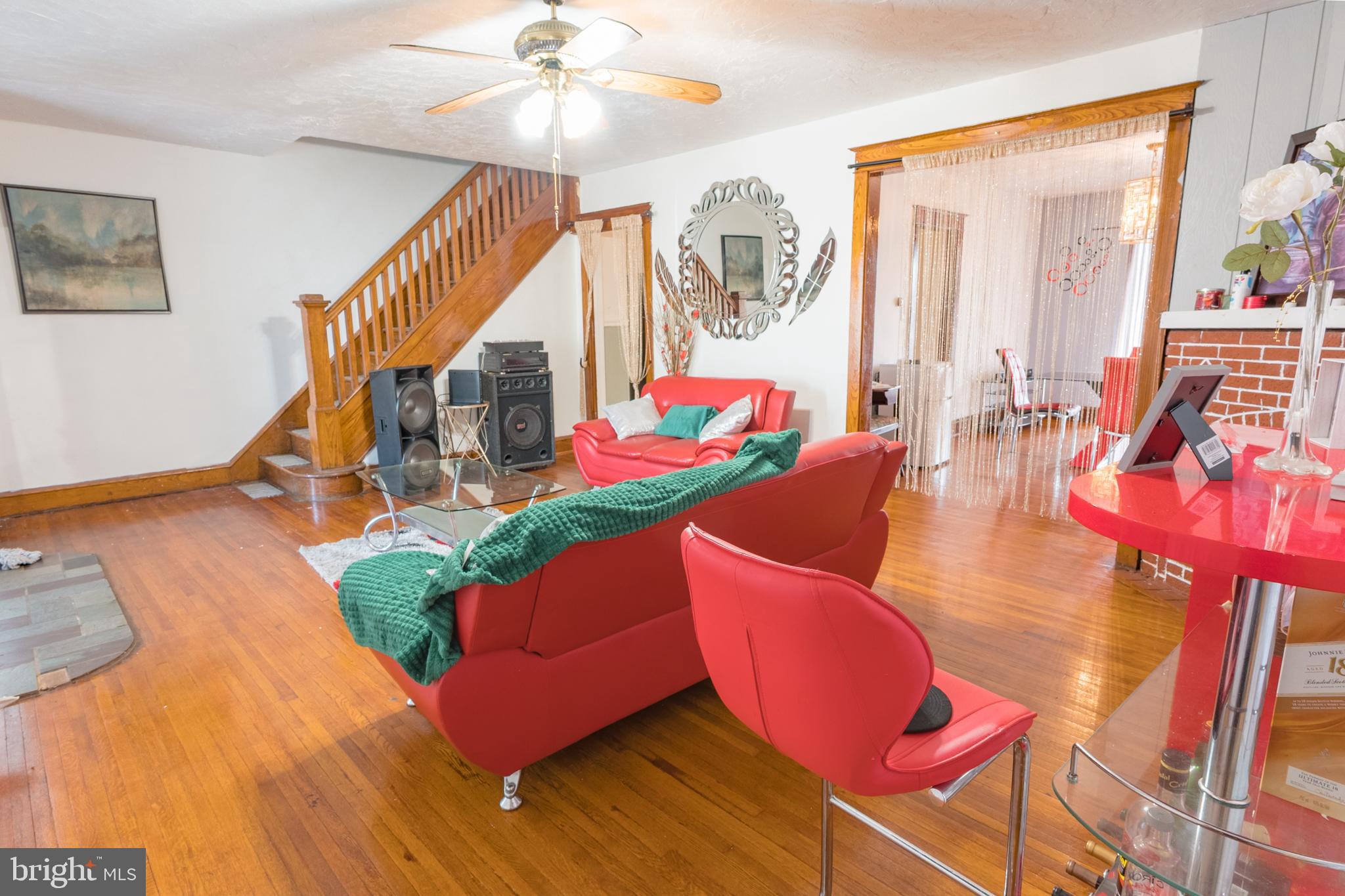 1020 Meade Street Reading, PA 19611 - Photo 5 of 28 a living room with furniture and a wooden floor