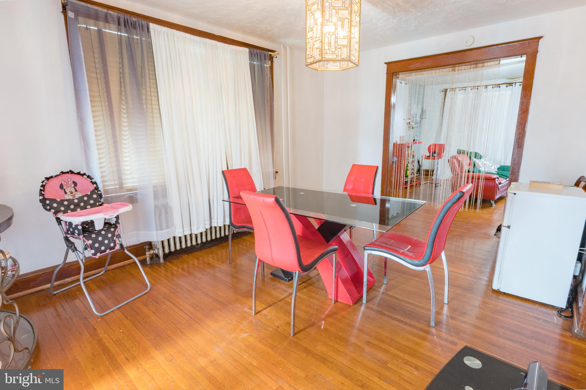 1020 Meade Street Reading, PA 19611 - Photo 8 of 28 a dining room with furniture and wooden floor