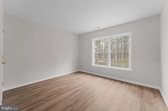 an aerial view of a house with outdoor space