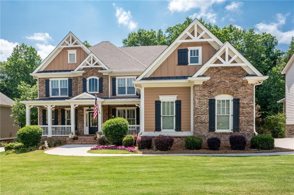322 Carmichael Circle Canton, GA 30115 - Photo 1 of 1 a front view of a house with a yard