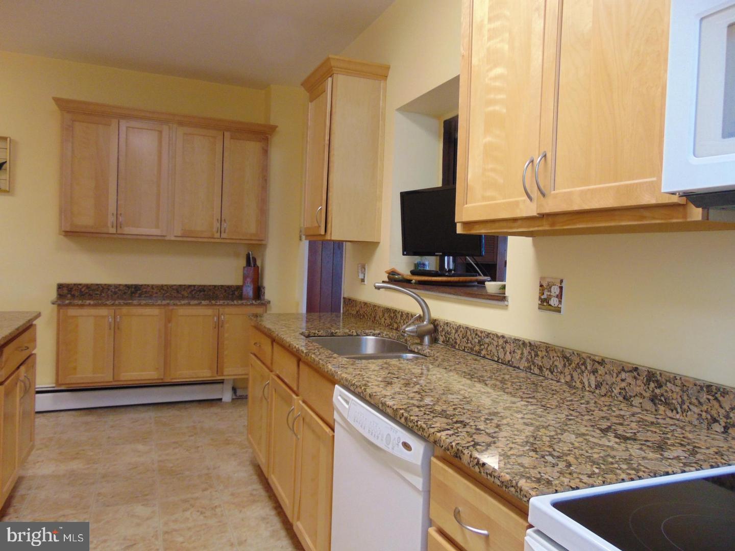 12916 Community Road Baltimore, MD 21220 - Photo 13 of 25 Kit Pass Thru to Rec Rm..Great for Entertaining