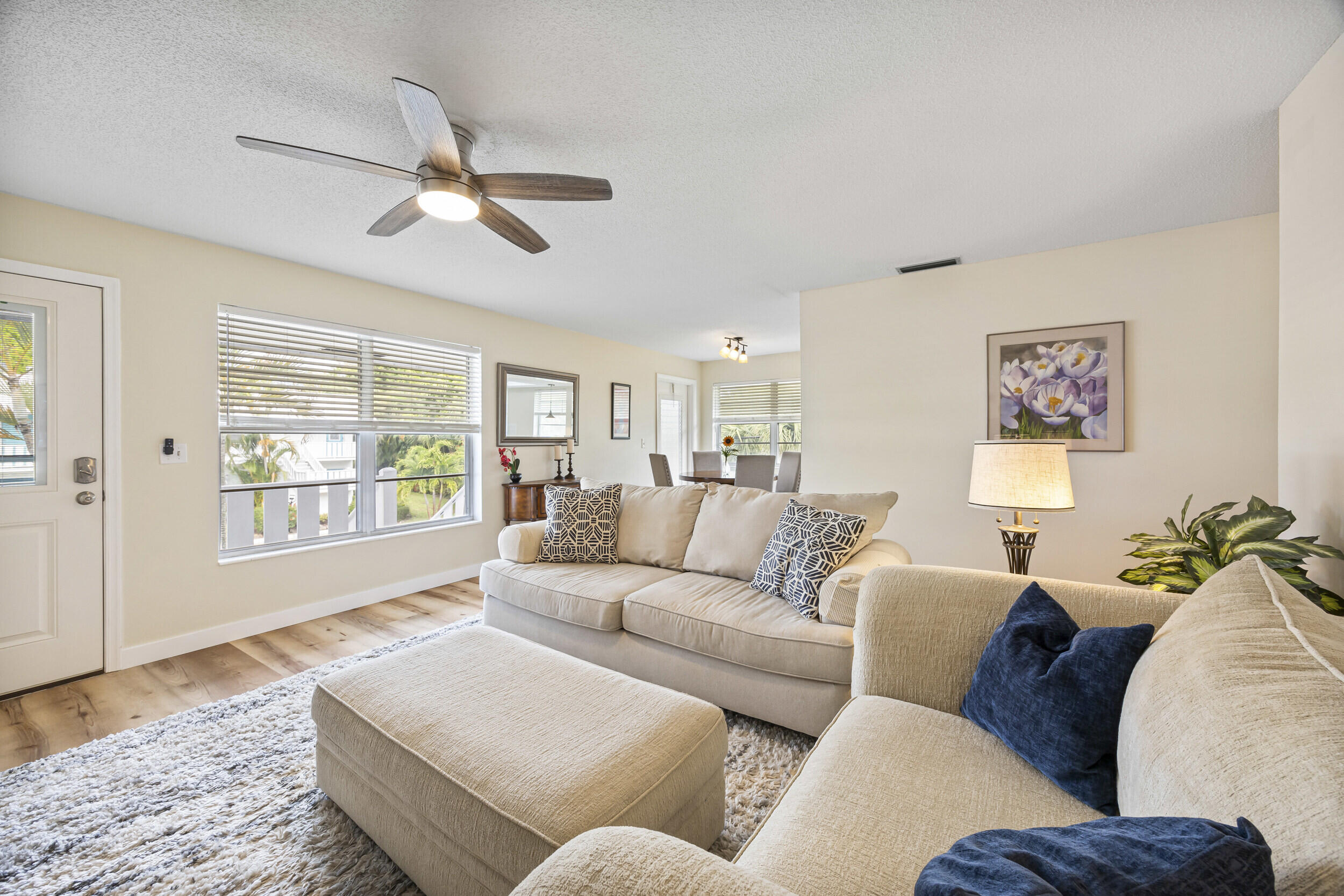 2929 Southeast Ocean Boulevard, Unit 10510 Stuart, FL 34996 - Photo 2 of 37 a living room with furniture and a window