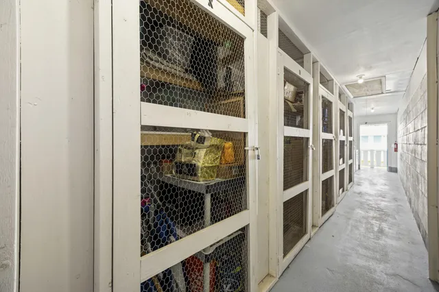 a view of a swimming pool with a lounge chair