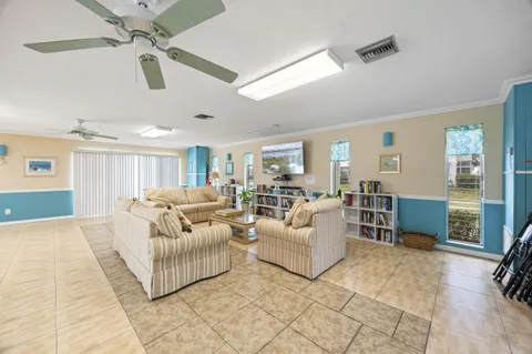a kitchen with a sink cabinets and window