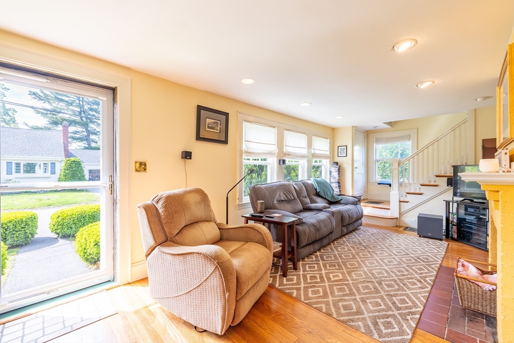 9 Parkman Road Reading, MA 01867 - Photo 5 of 34 a living room with furniture and a large window