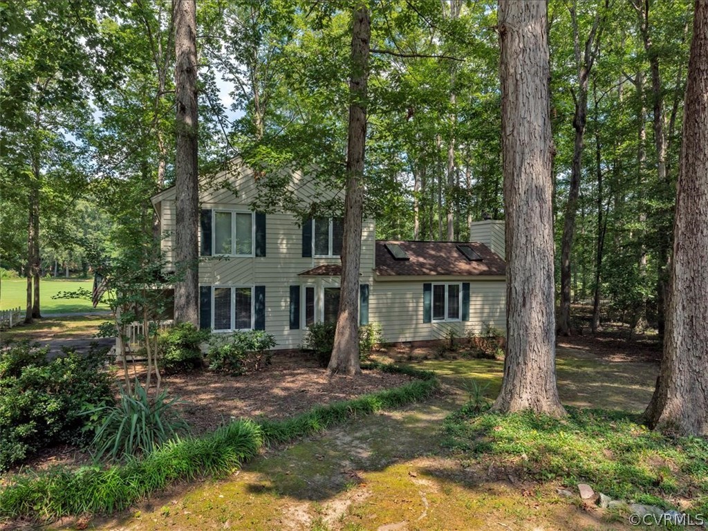 13800 Sterlings Bridge Road Midlothian, VA 23112 - Photo 2 of 31 a front view of a house with a yard