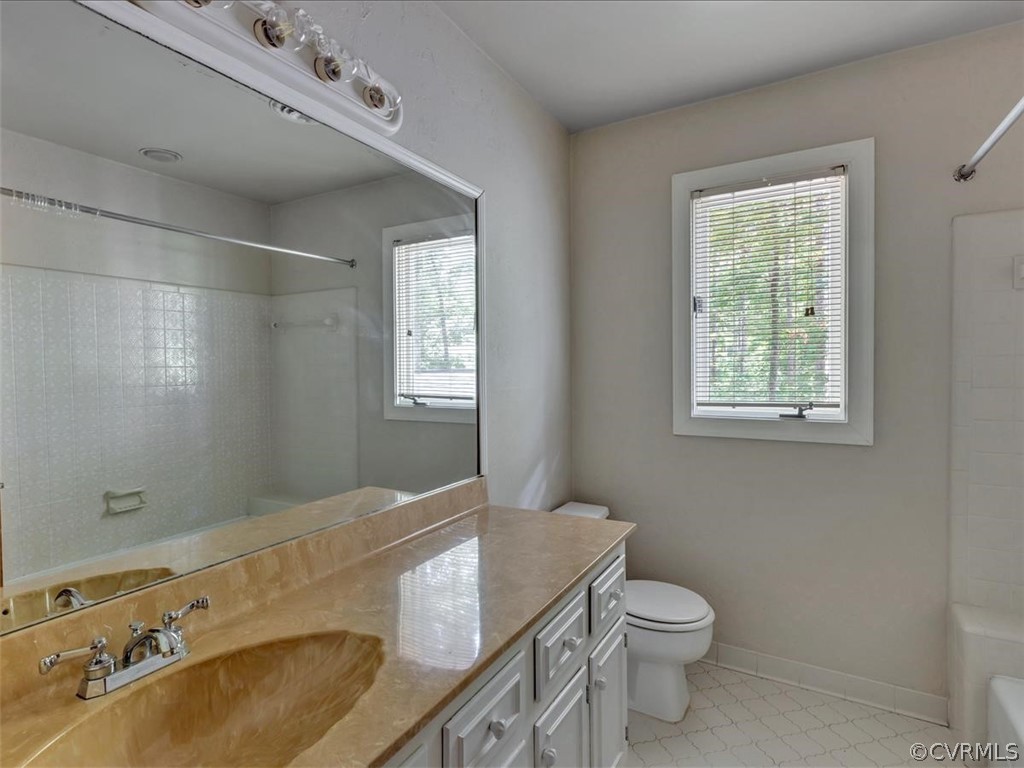 13800 Sterlings Bridge Road Midlothian, VA 23112 - Photo 22 of 31 a bathroom with a sink toilet and window