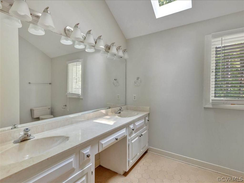 13800 Sterlings Bridge Road Midlothian, VA 23112 - Photo 24 of 31 a bathroom with a sink a mirror and a window