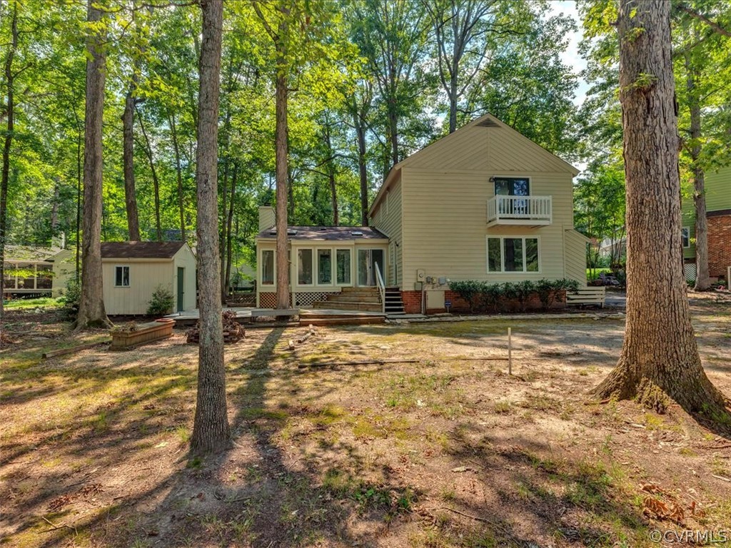 13800 Sterlings Bridge Road Midlothian, VA 23112 - Photo 31 of 31 a front view of a house with a yard and garage