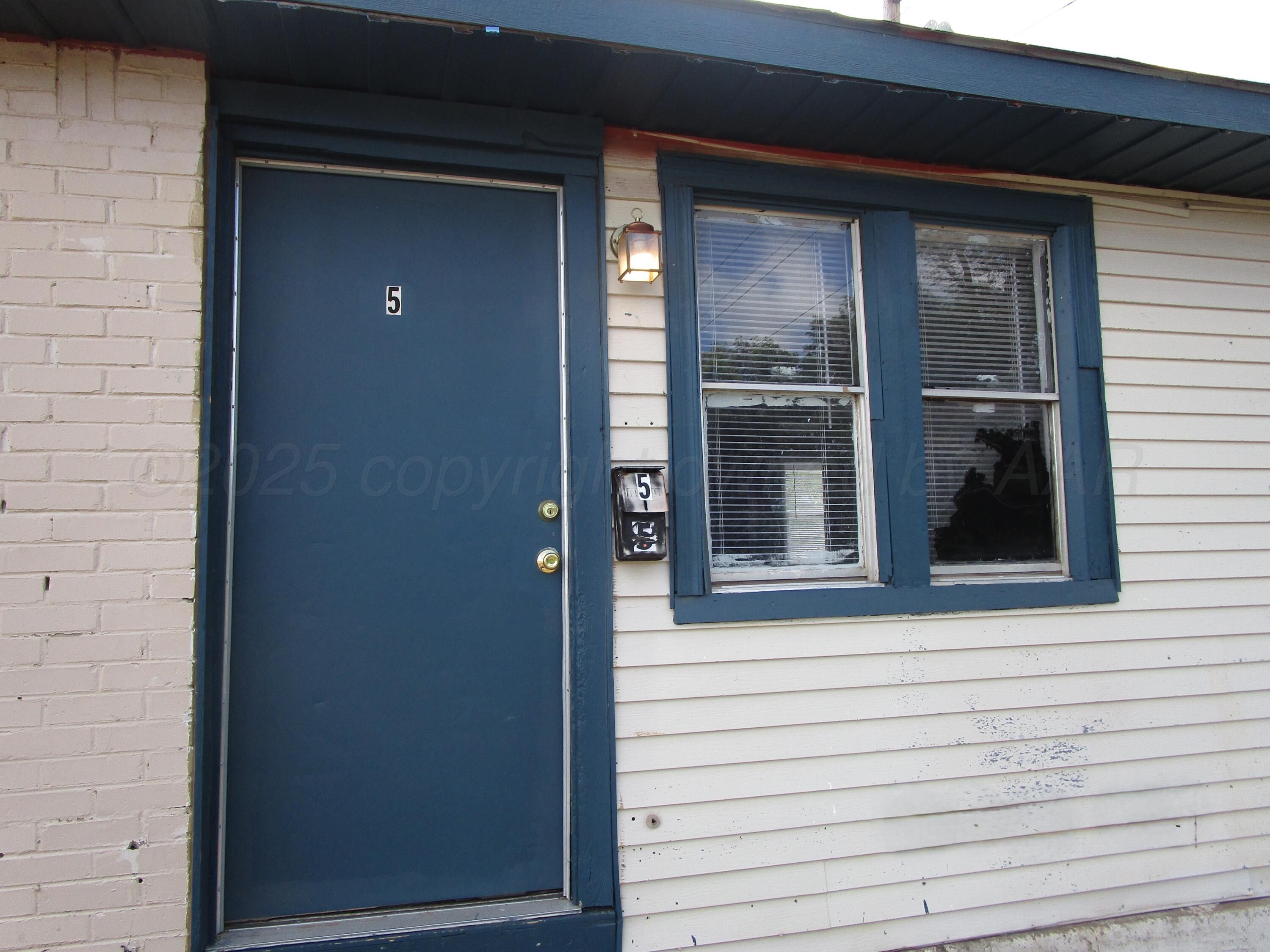 607 West Wilson Street, Unit 5 Borger, TX 79007 - Photo 1 of 7 Front