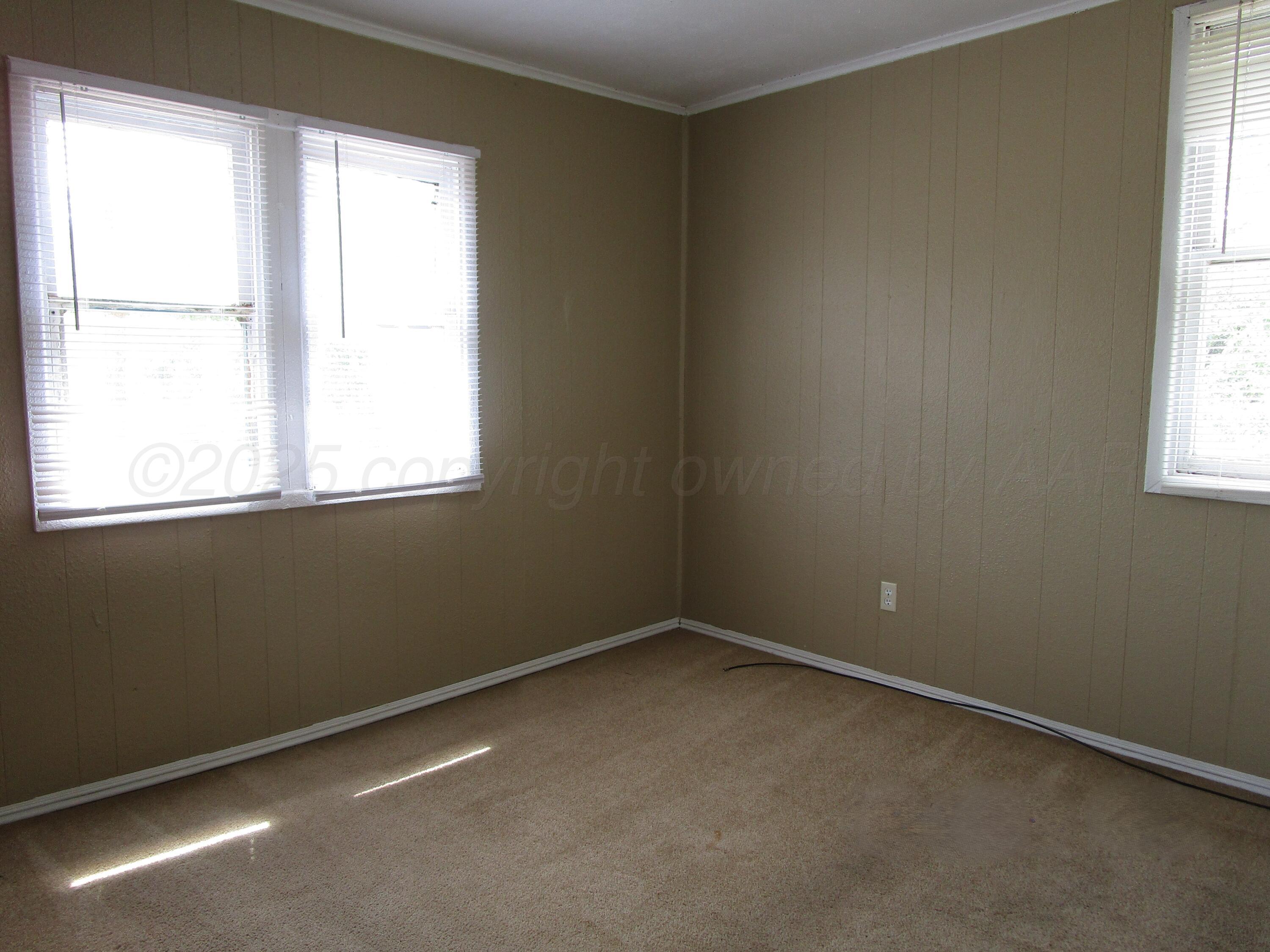 607 West Wilson Street, Unit 5 Borger, TX 79007 - Photo 5 of 7 Bedroom 1