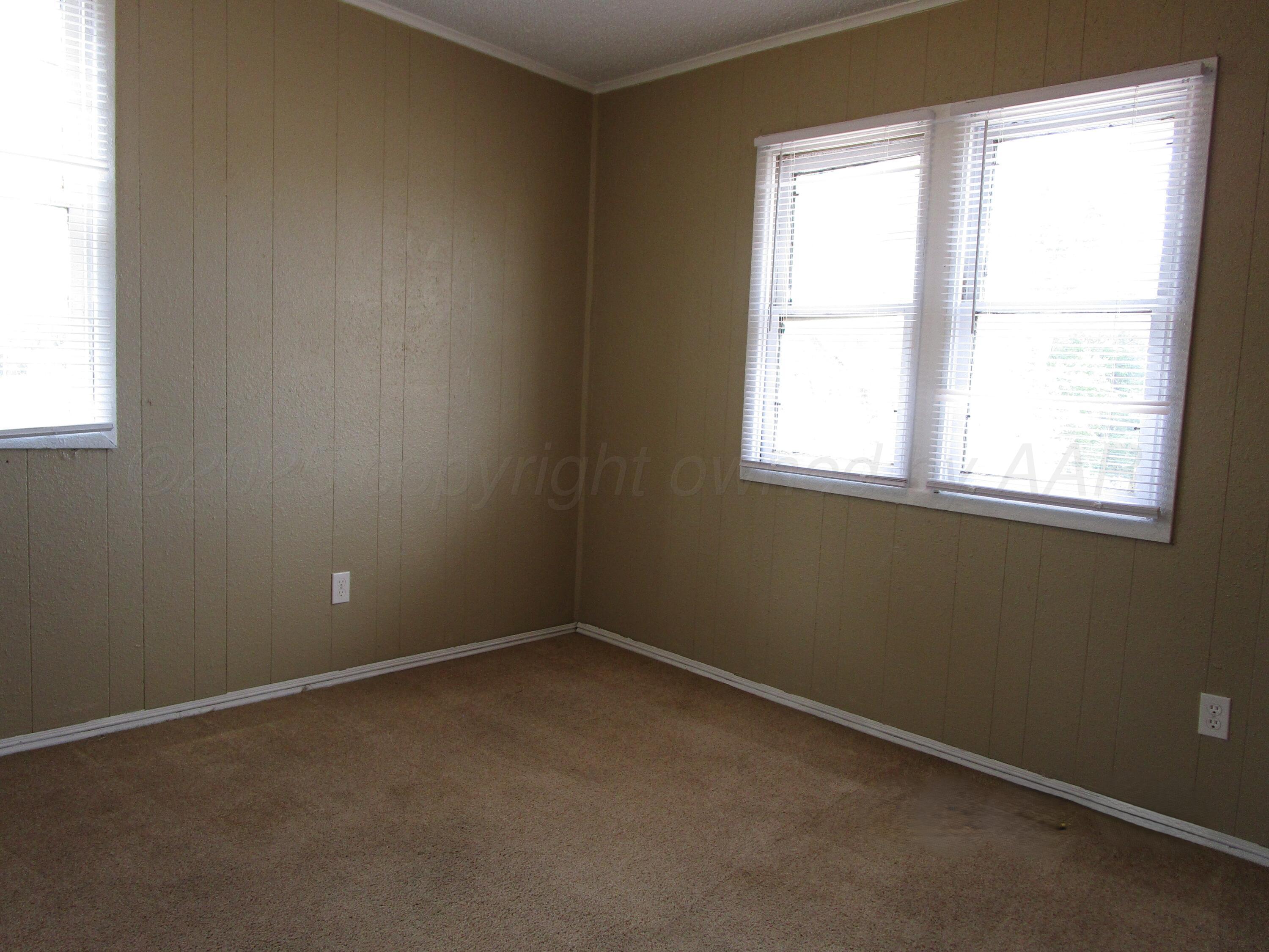 607 West Wilson Street, Unit 5 Borger, TX 79007 - Photo 6 of 7 Bedroom 2