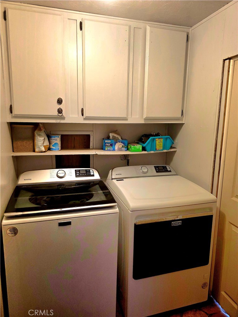 10623 Desert View Road Pinon Hills, CA 92372 - Photo 10 of 76 a utility room with dryer and washer