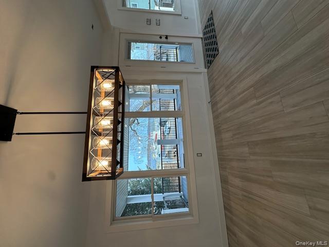 74 Beach Road Stony Point, NY 10980 - Photo 12 of 38 an empty room with window and wooden floor