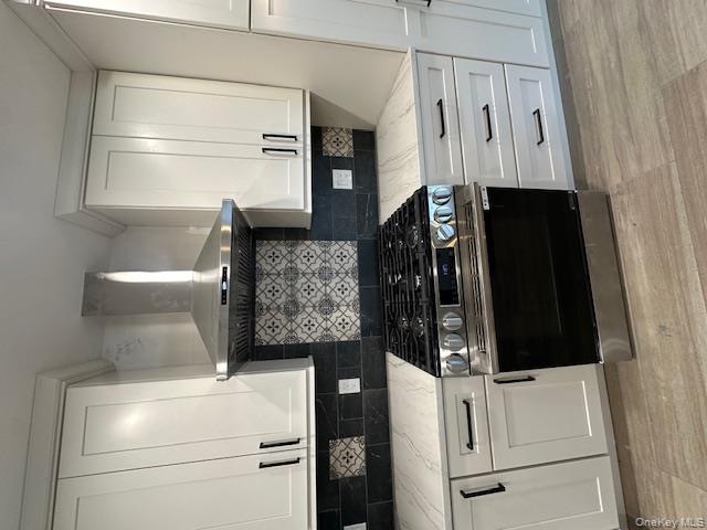 74 Beach Road Stony Point, NY 10980 - Photo 14 of 38 a stove top oven sitting inside of a kitchen