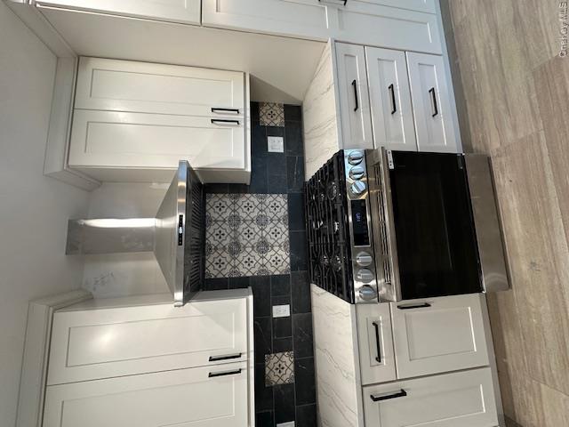 74 Beach Road Stony Point, NY 10980 - Photo 18 of 38 a stove top oven sitting inside of a kitchen