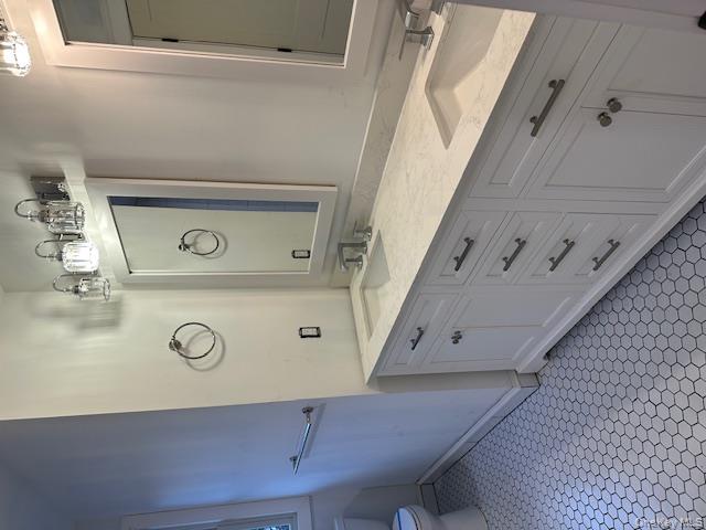 74 Beach Road Stony Point, NY 10980 - Photo 22 of 38 a bathroom with a sink and a mirror