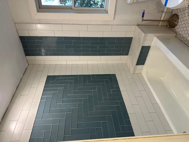 74 Beach Road Stony Point, NY 10980 - Photo 24 of 38 a bathroom with a bathtub and a shower