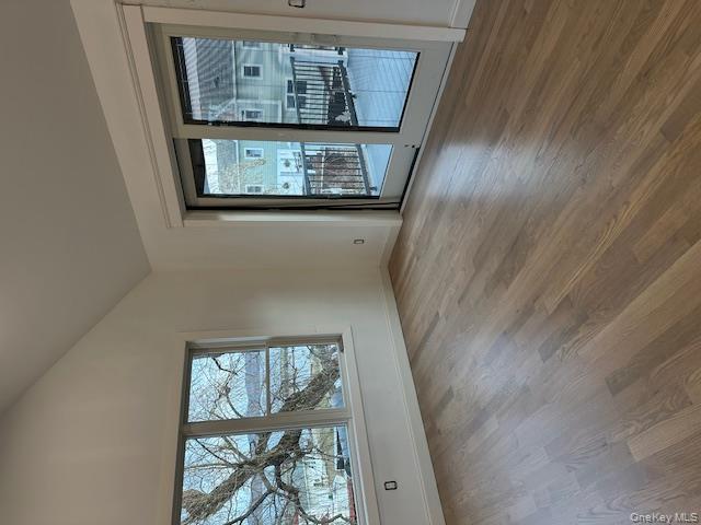 74 Beach Road Stony Point, NY 10980 - Photo 27 of 38 a view of a big room with wooden floor and windows