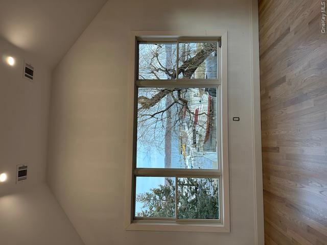 74 Beach Road Stony Point, NY 10980 - Photo 29 of 38 an empty room with wooden floor and windows