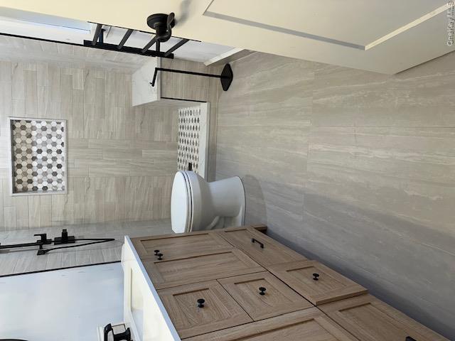 74 Beach Road Stony Point, NY 10980 - Photo 33 of 38 a bathroom with a sink a toilet and shower