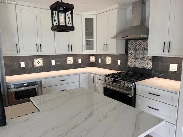 a kitchen with a stove and a sink