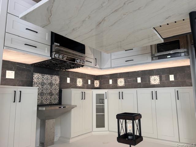 74 Beach Road Stony Point, NY 10980 - Photo 7 of 38 a kitchen with a stove and a sink