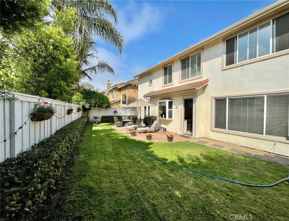 808 Carnaros San Clemente, CA 92672 - Photo 14 of 16 a front view of a house with patio and garden