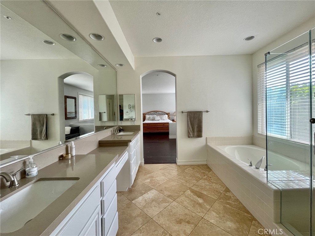 808 Carnaros San Clemente, CA 92672 - Photo 7 of 16 a en suite bathroom with a double vanity sink and a bathtub