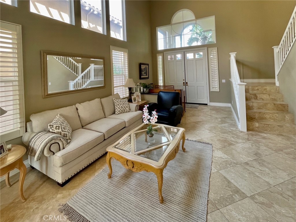 808 Carnaros San Clemente, CA 92672 - Photo 8 of 16 a living room with furniture and a mirror