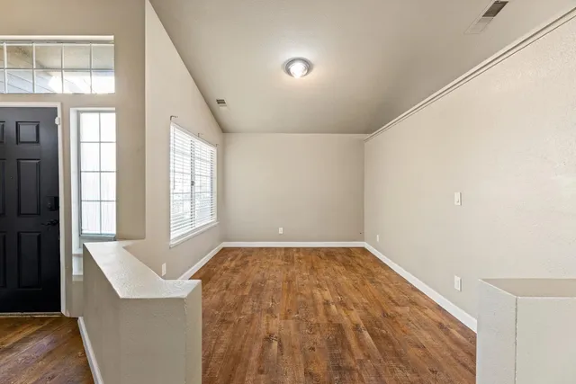 a view of an empty room and window